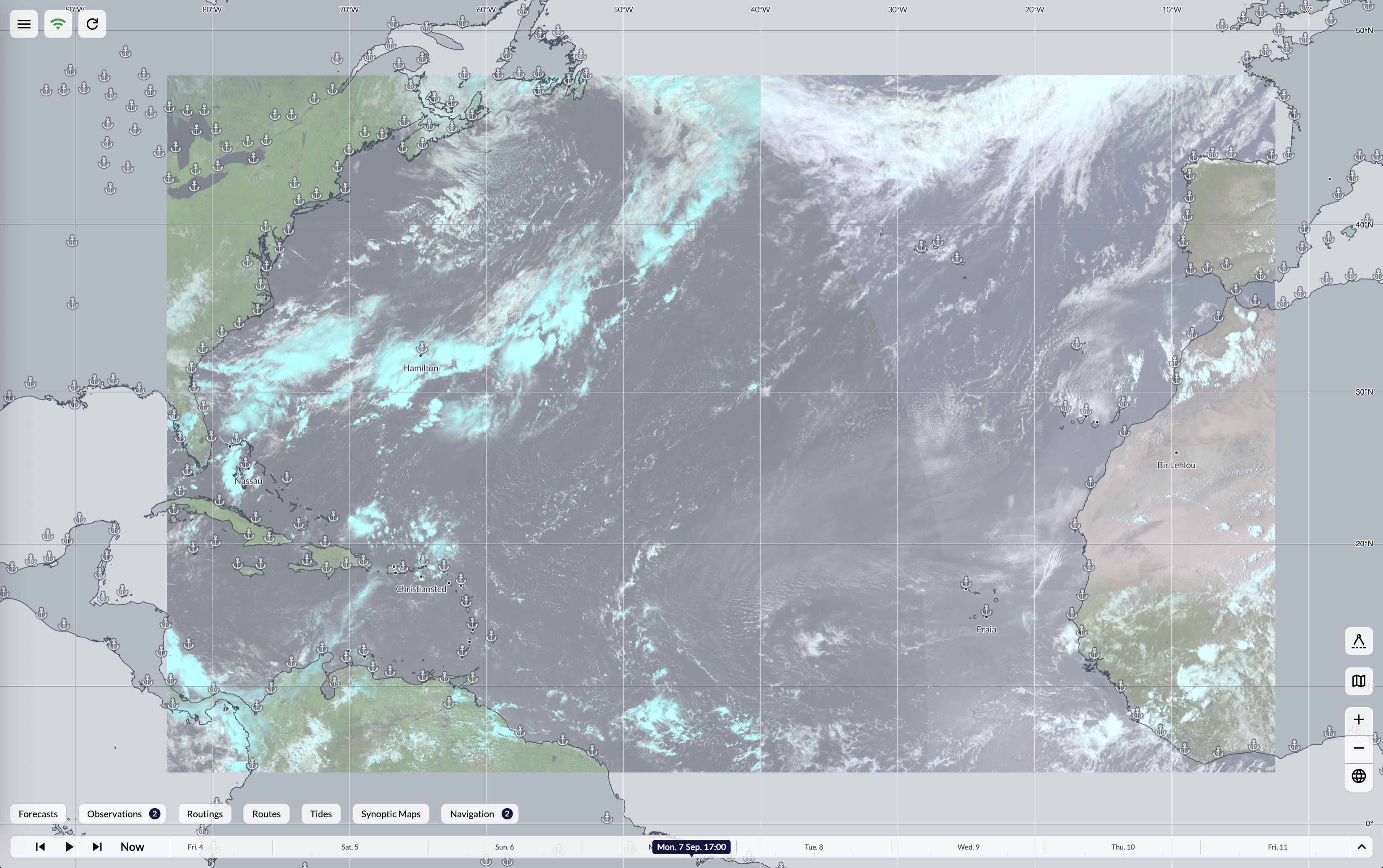 Satellite imagery layer over the map, showing cloud cover across the Atlantic